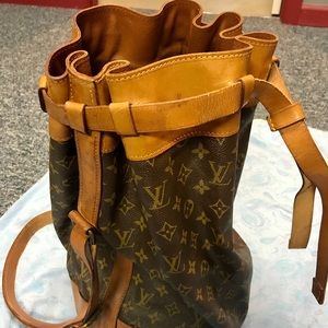 Vintage thick strap LV bucket bag.